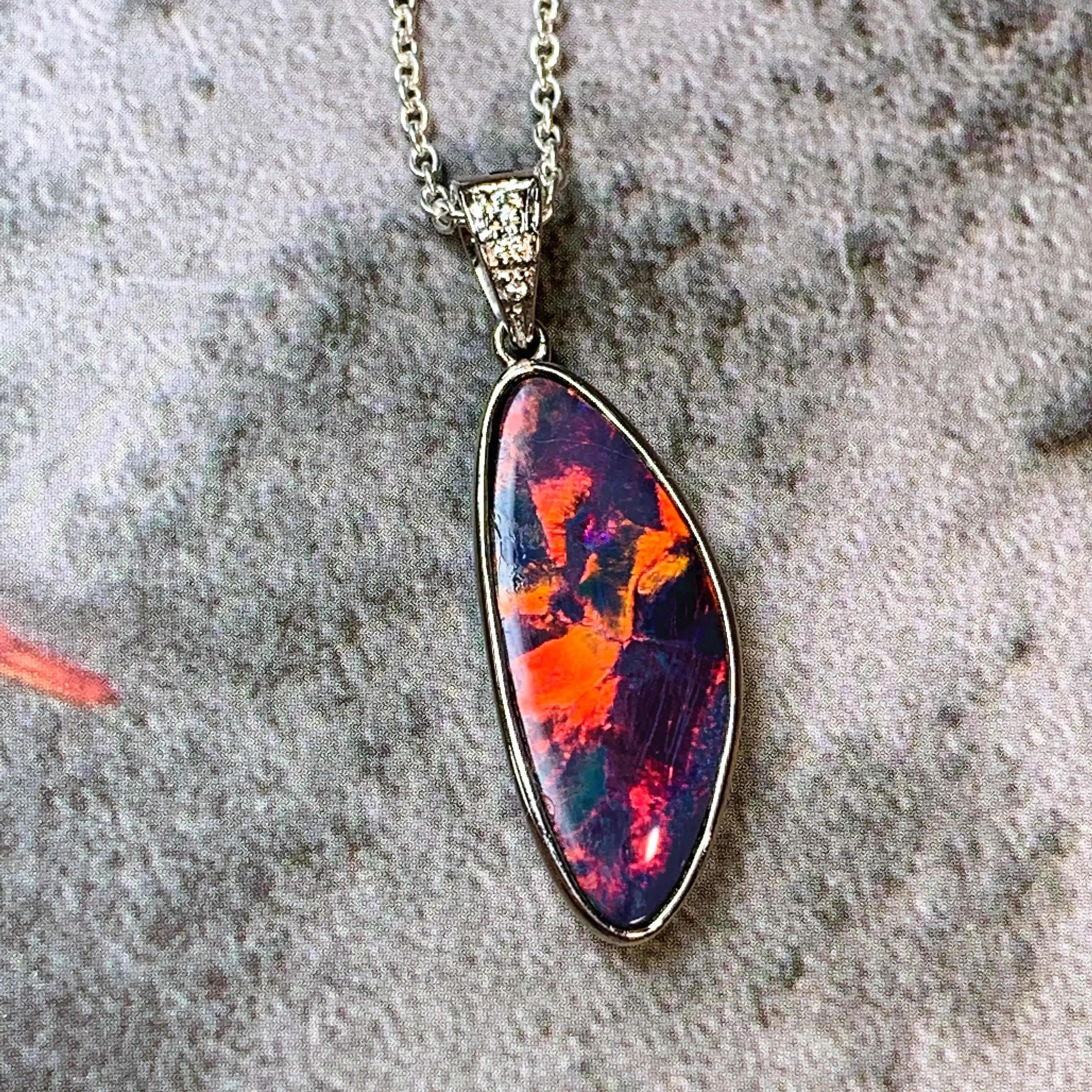 14kt White Gold Red Fiery Opal and Diamond pendant