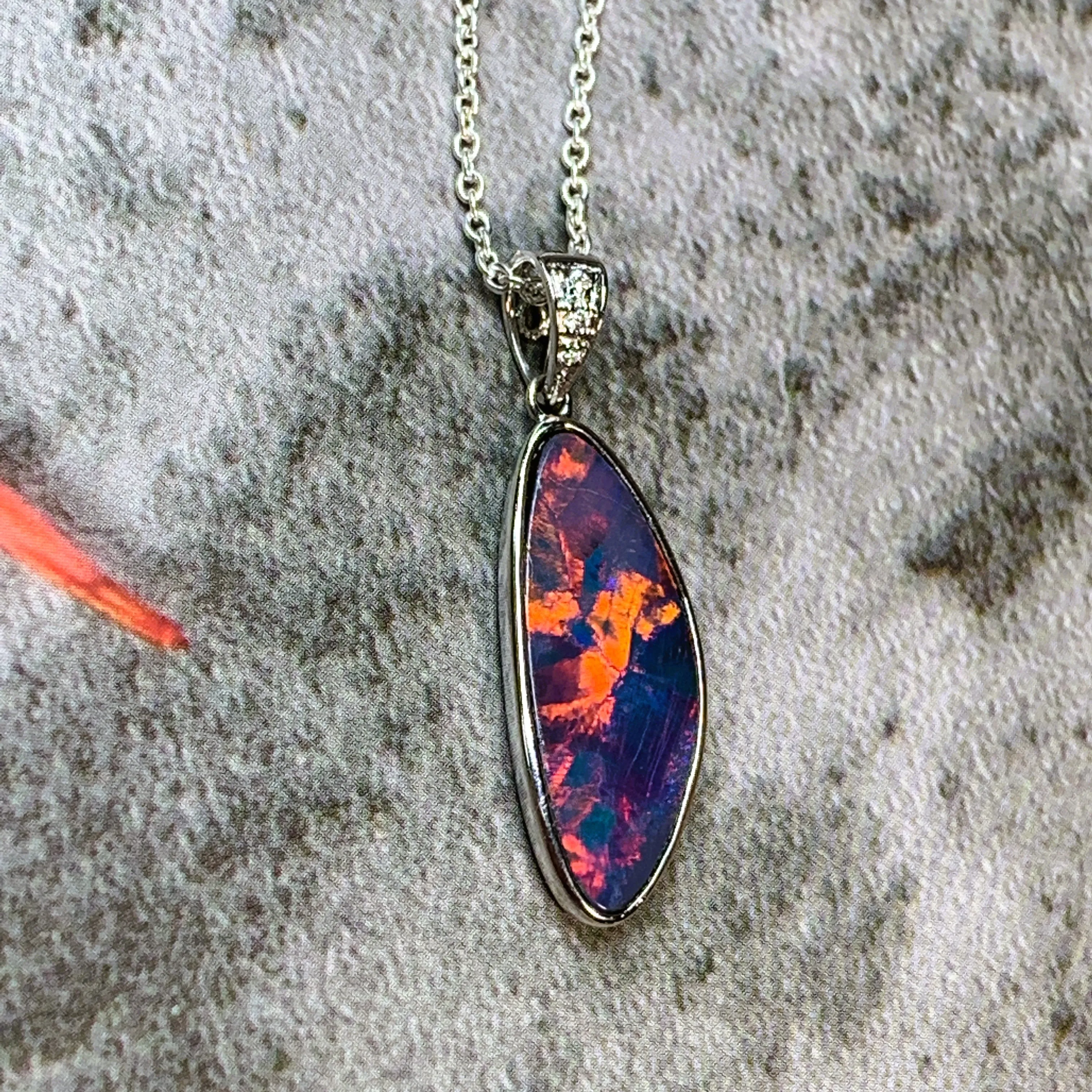 14kt White Gold Red Fiery Opal and Diamond pendant