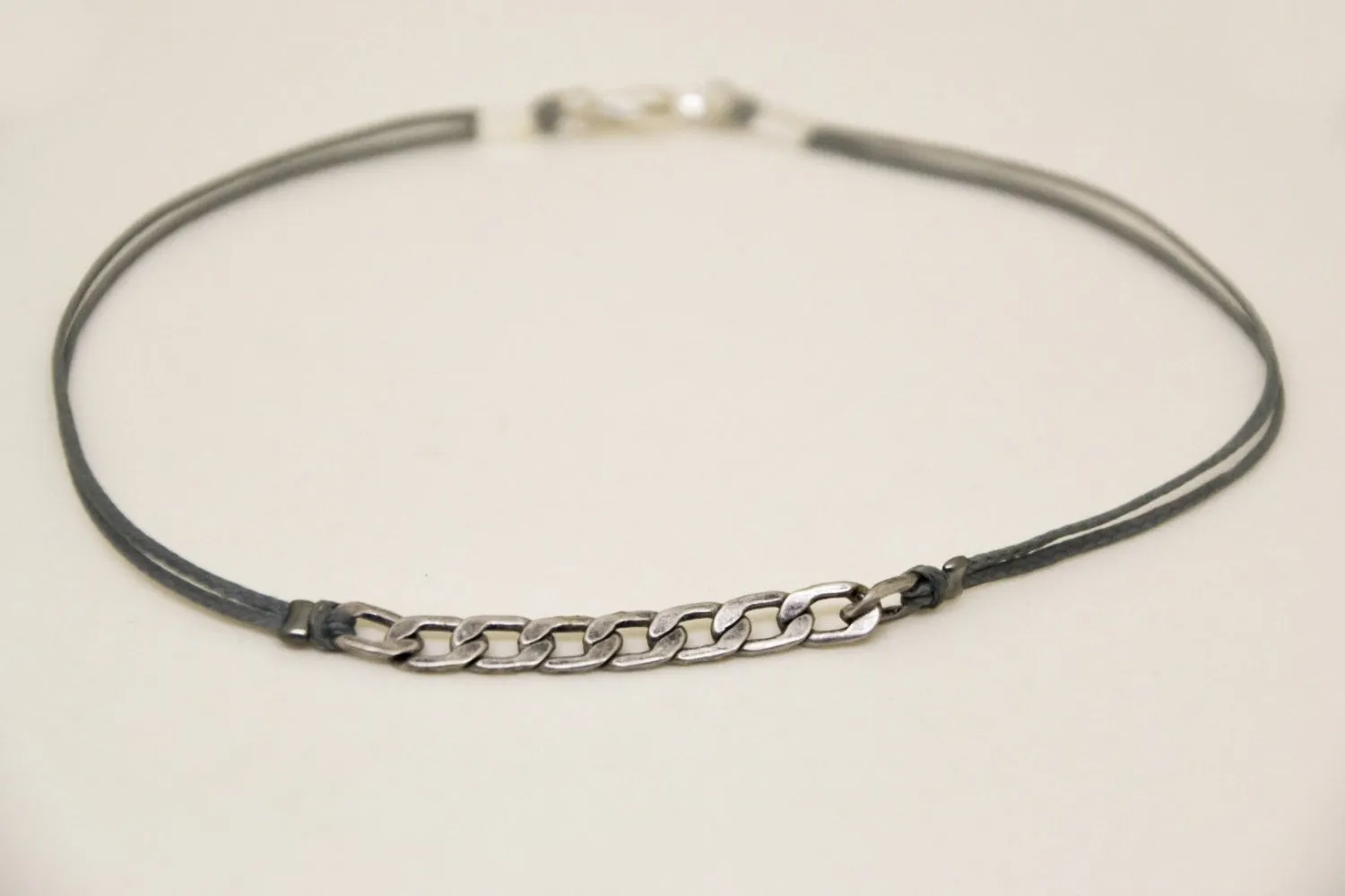 Men's anklet with a silver flat chain and a gray cord, handmade gift for him