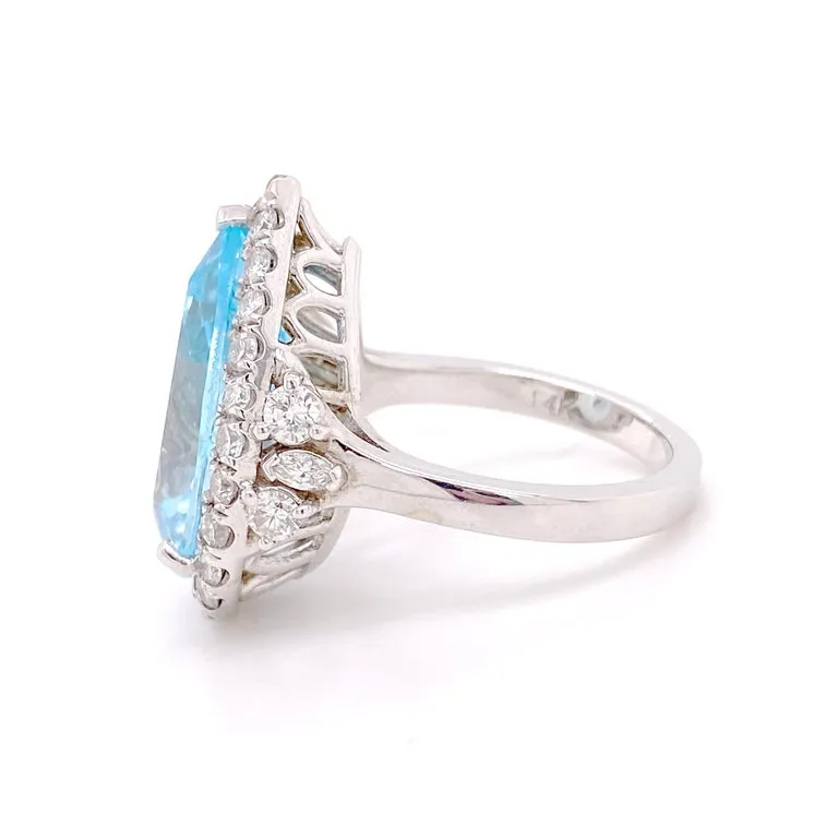 Pear Shaped Blue Topaz Diamond Halo Ring