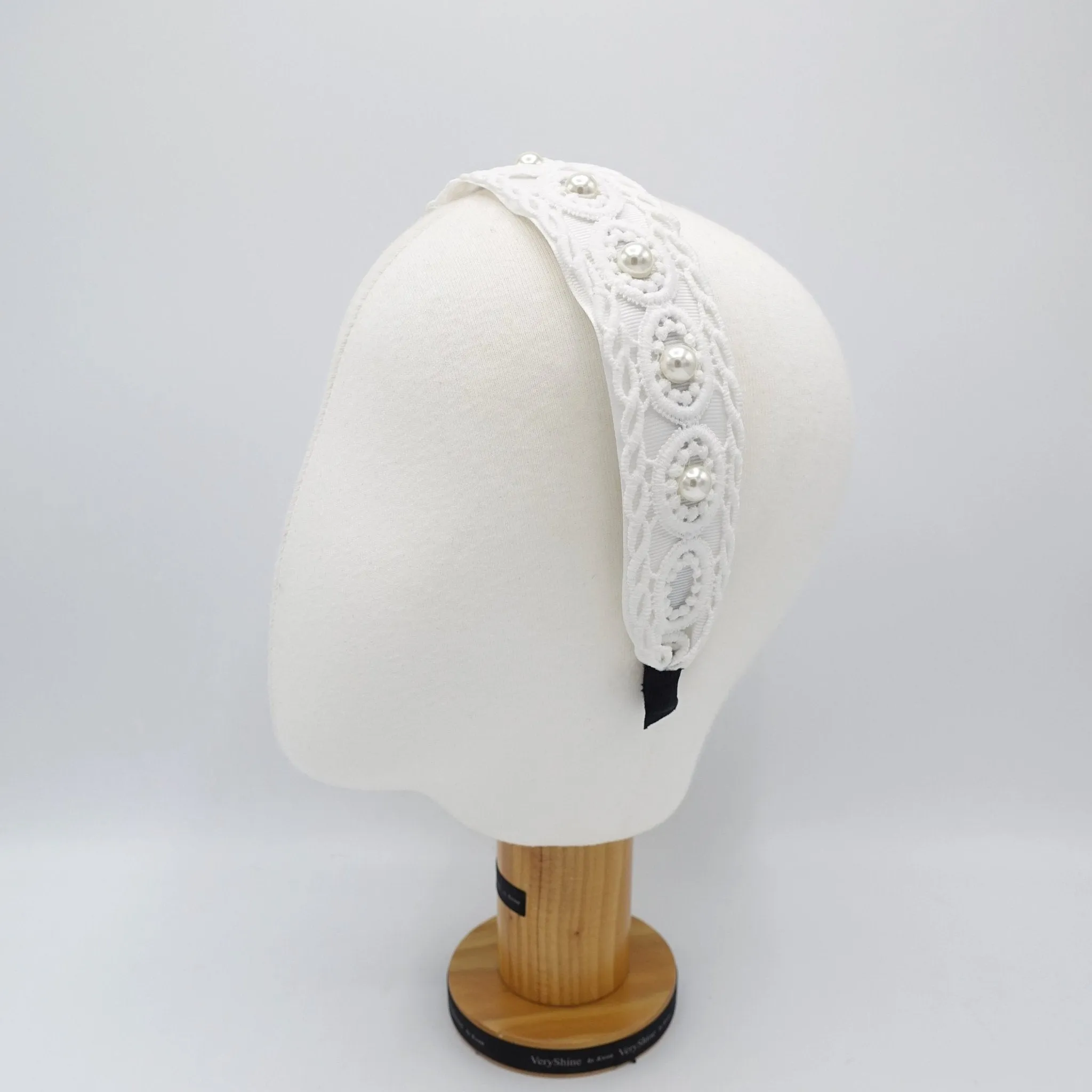 pearl embellished circle ellipse headband for women